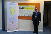 Dr Tom Russ with his dementia research poster